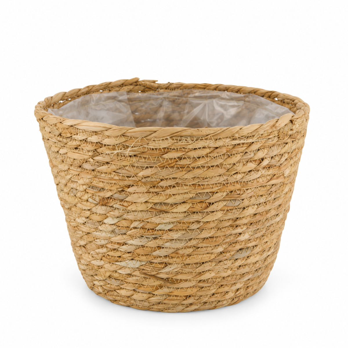 Cesto redondo para plantas em fibra natural, com forro interior em plástico, sobre fundo branco